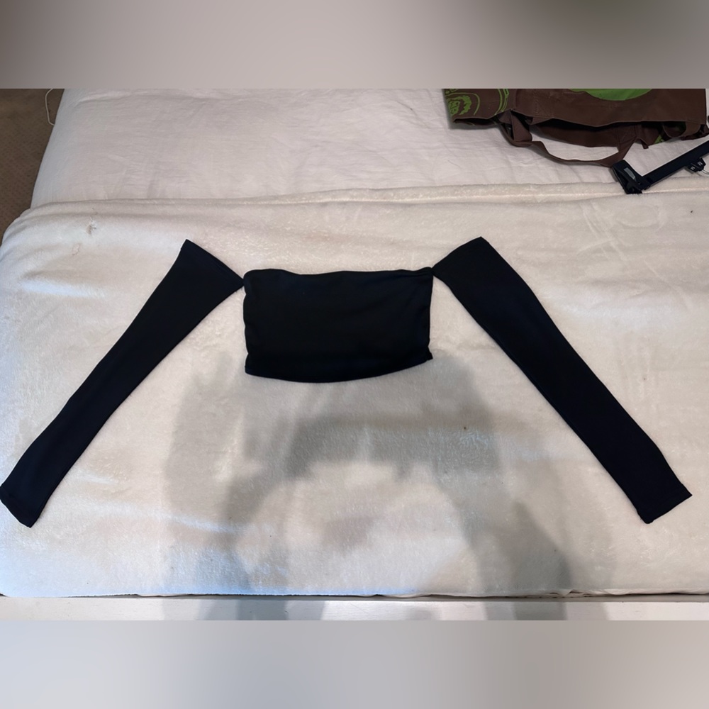 Black crop top with attached sleeves